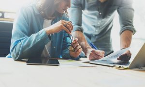 building consultants reviewing property report