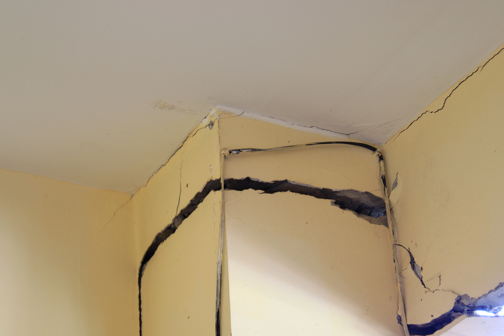 House with event damage and structural cracks